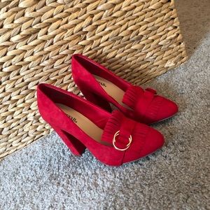 Red shoes with buckles